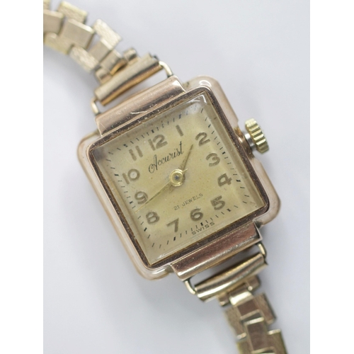 89 - A ladies 9ct gold vintage wristwatch, the circular dial with Arabic numerals and mother of pearl inl... 