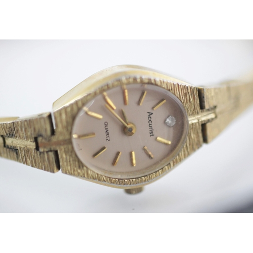 89 - A ladies 9ct gold vintage wristwatch, the circular dial with Arabic numerals and mother of pearl inl... 