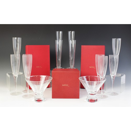 592 - An assorted collection of stem glasses, comprising eight red wine glasses, eight martini glasses, a ... 