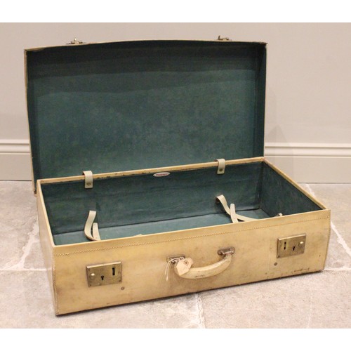 632 - A vellum suitcase by Pendragon, early 20th century, with brass fittings and green leather effect int... 