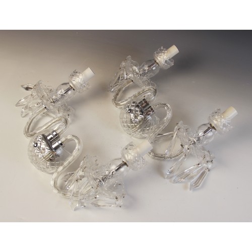 607 - A pair of French glass two branch wall light fittings, early 20th century, each formed as two 'S' sh... 