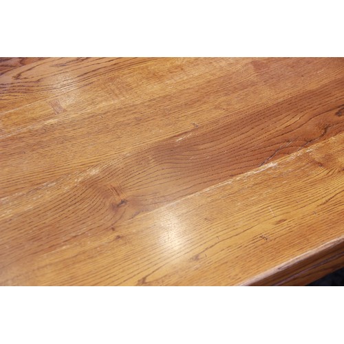 820 - An oak draw leaf refectory table by Willis and Gambier, late 20th century, the cleated slab top with... 