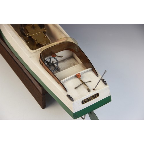 670 - A Tri-Ang clockwork speed boat, early 20th century circa 1930, the wooden hull painted in green and ... 