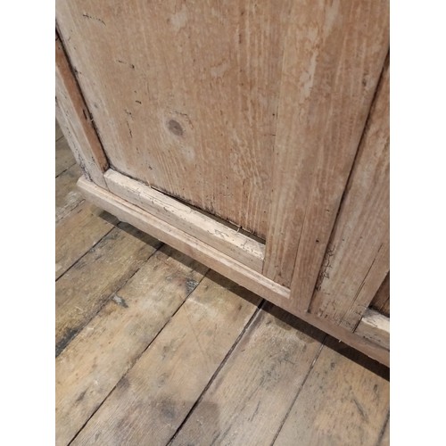 804 - A Victorian pine and later constructed two door cupboard, the rectangular top with moulded edge abov... 