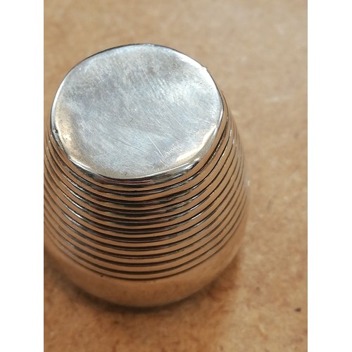 39 - A George III silver nutmeg grater, Samuel Meriton II, London 1789, modelled as a barrel with turned ... 