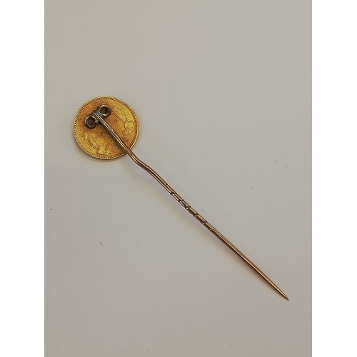 115 - A selection of stick pins and accessories, to include a carved hardstone cameo stick pin, depicting ... 