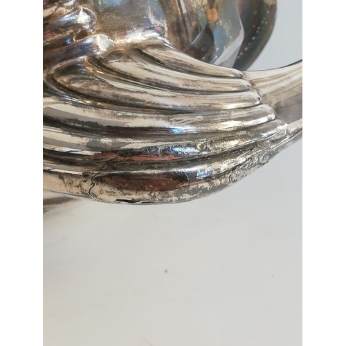 41 - A late Victorian silver teapot, Chester 1899 (maker's mark worn), of inverted baluster faceted form,... 