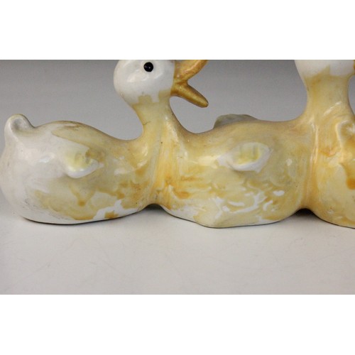 555 - A collection of Beswick birds, to include a Leghorn Cockerel, Model no. 1892, 24cm high, two swan fa... 