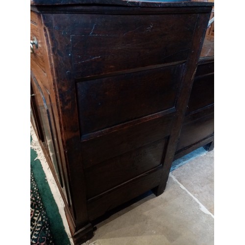 709 - An 18th century oak dresser base, the moulded plank top above three oak lined drawers and a pair of ... 