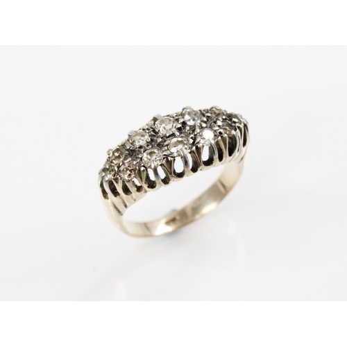 124 - A Victorian diamond boat ring, comprising twelve graduated old cut diamonds, measuring between 2.20m... 