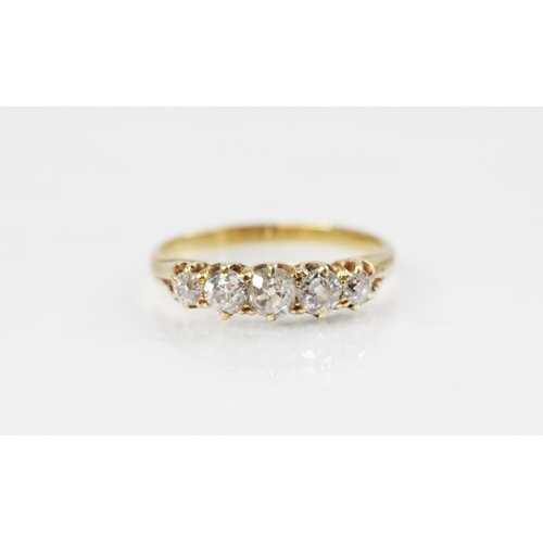 125 - A Victorian five-stone diamond ring, comprising five graduated old cut diamonds, the central diamond... 