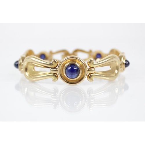 131 - A Swedish 18ct gold sapphire set bracelet by Hugo Stromdahl, designed as alternating circular and ly... 