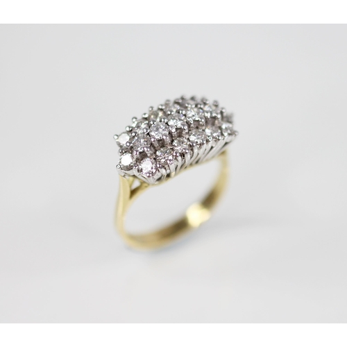 133 - A diamond cluster ring, comprising three rows of round brilliant cut diamonds, cluster measuring 19m... 