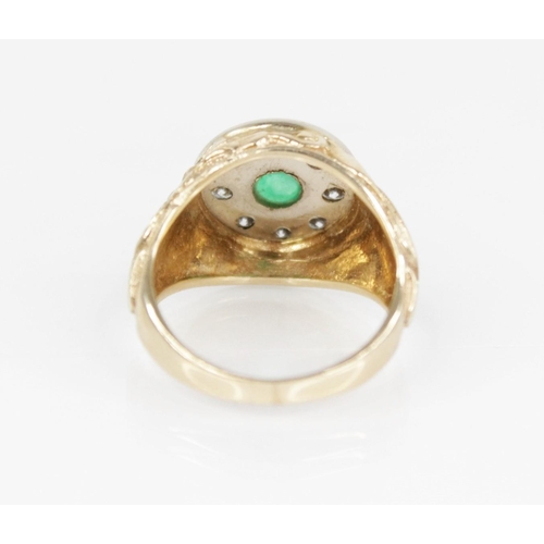 141 - An emerald and diamond 14ct gold target ring, the central circular cluster designed as a circular em... 