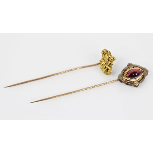 152 - A Victorian 'golden nugget' stick pin, the (untested) nugget measuring 20mm x 12mm, upon a gold colo... 