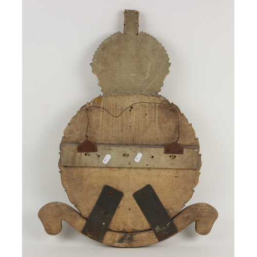 163 - ROYAL AIR FORCE INTEREST: A post World War I relief carved and painted wooden wall badge for the Roy... 