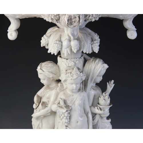 390 - A Paris porcelain white glazed table centre of large proportions, early 19th century, the central pi... 