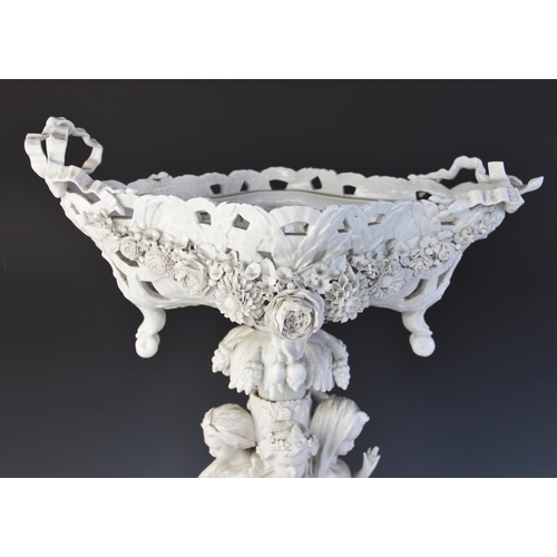 390 - A Paris porcelain white glazed table centre of large proportions, early 19th century, the central pi... 