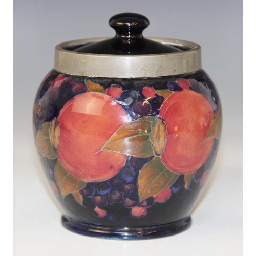 398 - A Moorcroft metal mounted tobacco jar and cover in the Pomegranate pattern on cobalt blue ground, ea... 