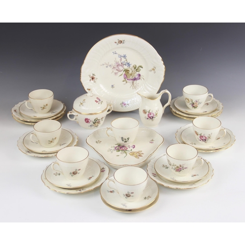 405 - A Royal Copenhagen part tea service, comprising: eight teacups and saucers, eight side plates, a suc... 