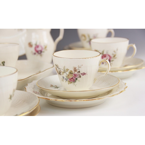 405 - A Royal Copenhagen part tea service, comprising: eight teacups and saucers, eight side plates, a suc... 