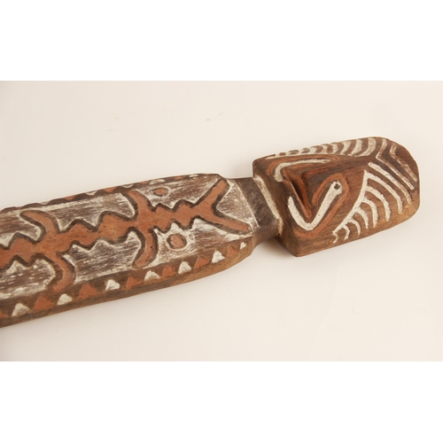 467 - Three large Oceanic Papau New Guinea carved wooden painted Gope boards, the largest 105cm long (3)