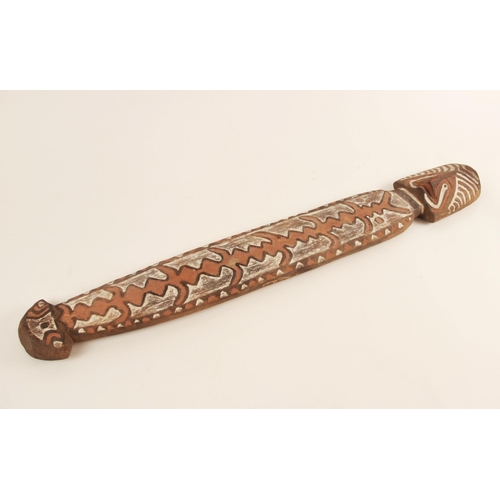 467 - Three large Oceanic Papau New Guinea carved wooden painted Gope boards, the largest 105cm long (3)