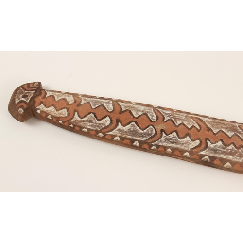 467 - Three large Oceanic Papau New Guinea carved wooden painted Gope boards, the largest 105cm long (3)