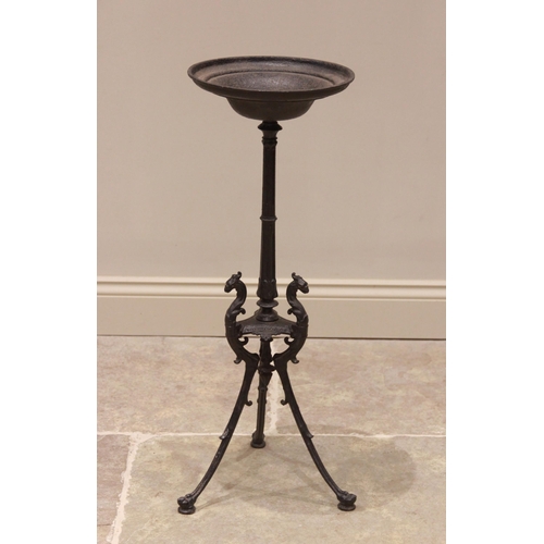 595 - A 19th century cast iron gueridon/candelabra stand bearing a label 'E G Zimmermann Hanau', the bowl ... 