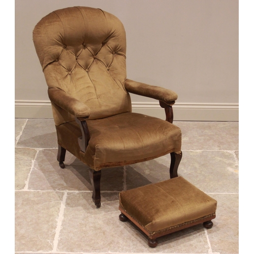 724 - A late Victorian button back library chair, the padded arms enclosing a sprung seat raised upon fron... 