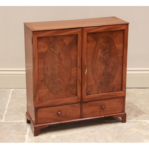 732 - A 19th century mahogany apprentice piece/collectors cabinet, in the form of a George III linen press... 