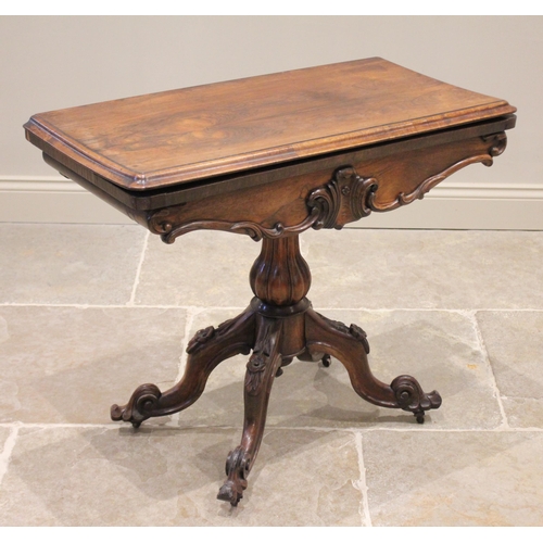 738 - A mid 19th century rosewood pedestal card table, the rectangular moulded top opening to a circular b... 