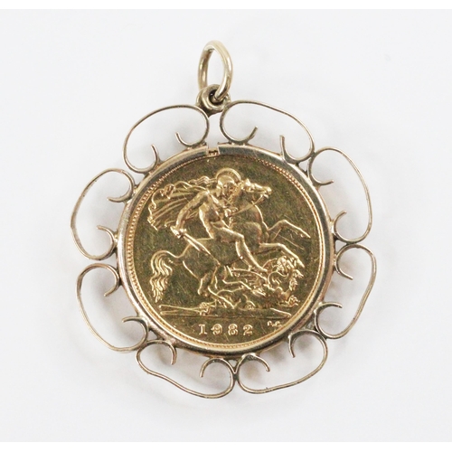 75 - An Elizabeth II half sovereign, dated 1982, set to a 9ct gold scrolling pendant mount, weight 6.2gms