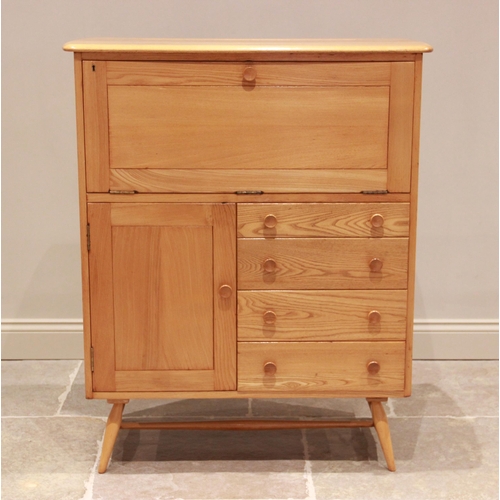 772 - An Ercol style blonde elm side cabinet, mid 20th century, the fall front above an arrangement of fou... 