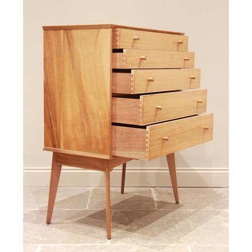 775 - A walnut chest of drawers by Alfred Cox for Maples, mid 20th century, comprising five graduated long... 