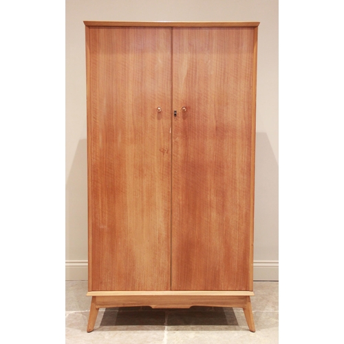 776 - A walnut gentleman's wardrobe by Alfred Cox for Maples, mid 20th century, the interior with hanging ... 