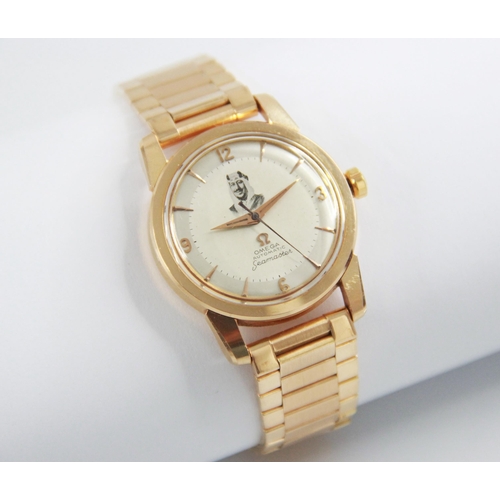 80 - An 18ct gold Omega Automatic Seamaster wristwatch, circa 1960, the champagne dial with gold toned Ar... 