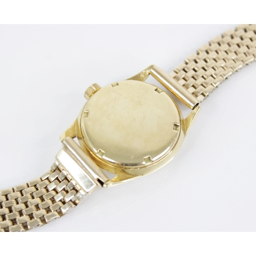 86 - A ladies Longines wristwatch, the circular cream dial with Arabic and baton markers, set to a gold c... 