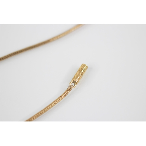 95 - A gold coloured woven link chain, the barrel clasp with engraved detail, 43cm long, weight 7.1gms