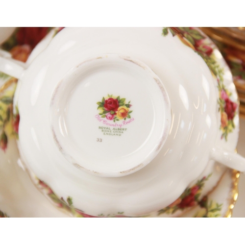 414 - A Royal Albert Old Country Roses part service, to include; six dinner plates, six salad plates, six ... 