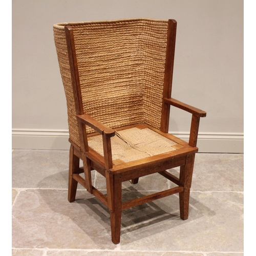 754 - An oak framed Orkney chair, 20th century, of typical form with woven twine and rush barrel back, scr... 