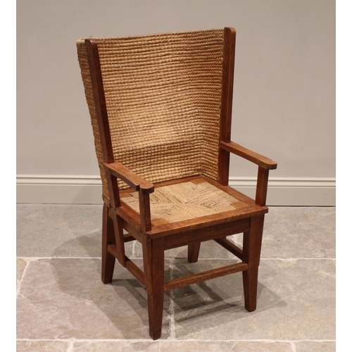 755 - An oak framed Orkney chair, 20th century, of typical form, with woven twine and rush barrel back, sc... 