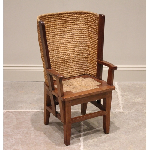 756 - A child's mahogany framed Orkney chair, 20th century, of typical form, with woven twine and rush bar... 