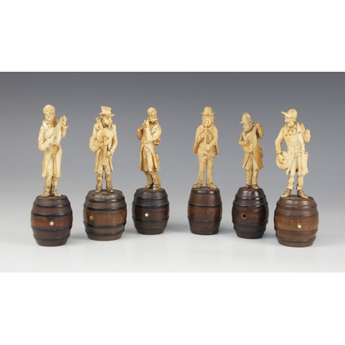 184 - A set of six carved ivory bandsmen, Bavaria (19th century), each modelled standing atop a coppered a... 