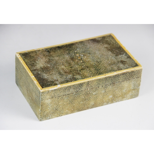 185 - An Art Deco shagreen cigarette box, of rectangular form, ivory mounts to hinged cover, fruitwood lin... 