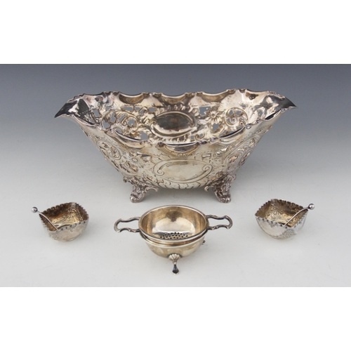 30 - A George V silver strainer and stand, Levi & Salaman, Birmingham 1928, the strainer with pierced bow... 