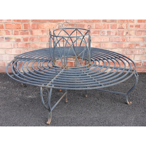 587 - A painted metal box section tree bench, late 20th century, formed from radiating rings upon curved s... 