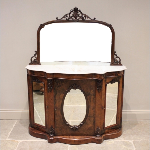 736 - A Victorian figured walnut mirror back chiffonier, the arched mirror back with a carved openwork fol... 