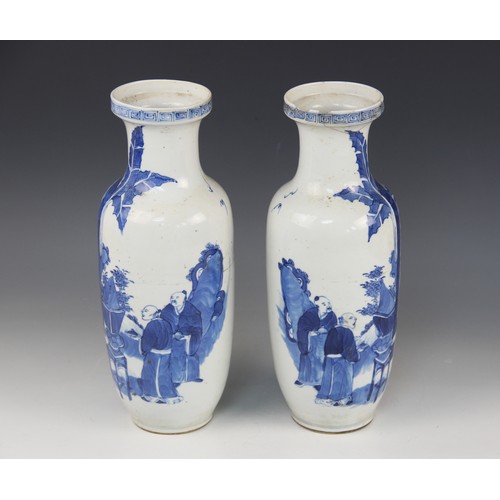 451 - A pair of Chinese blue and white vases, 19th century, each of baluster form and decorated to the ext... 