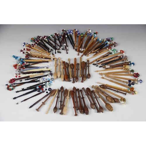 174 - A collection of lace bobbins, 19th century and later, the majority in various woods turned in tradit... 